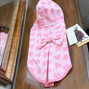 Rachel Zoe Pet Rain Coat (hooded) with heart pattern and bow. Size Small. Pink.